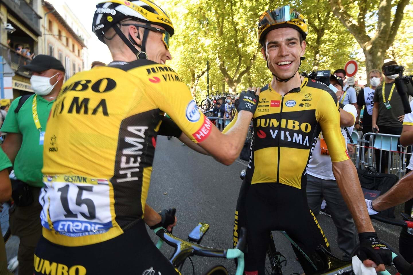 Wout van Aert receives congratulations from a teammate after his strong performance.