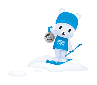The mascot of Visma Ski Classics 4 Kids stands presenting a medal.
