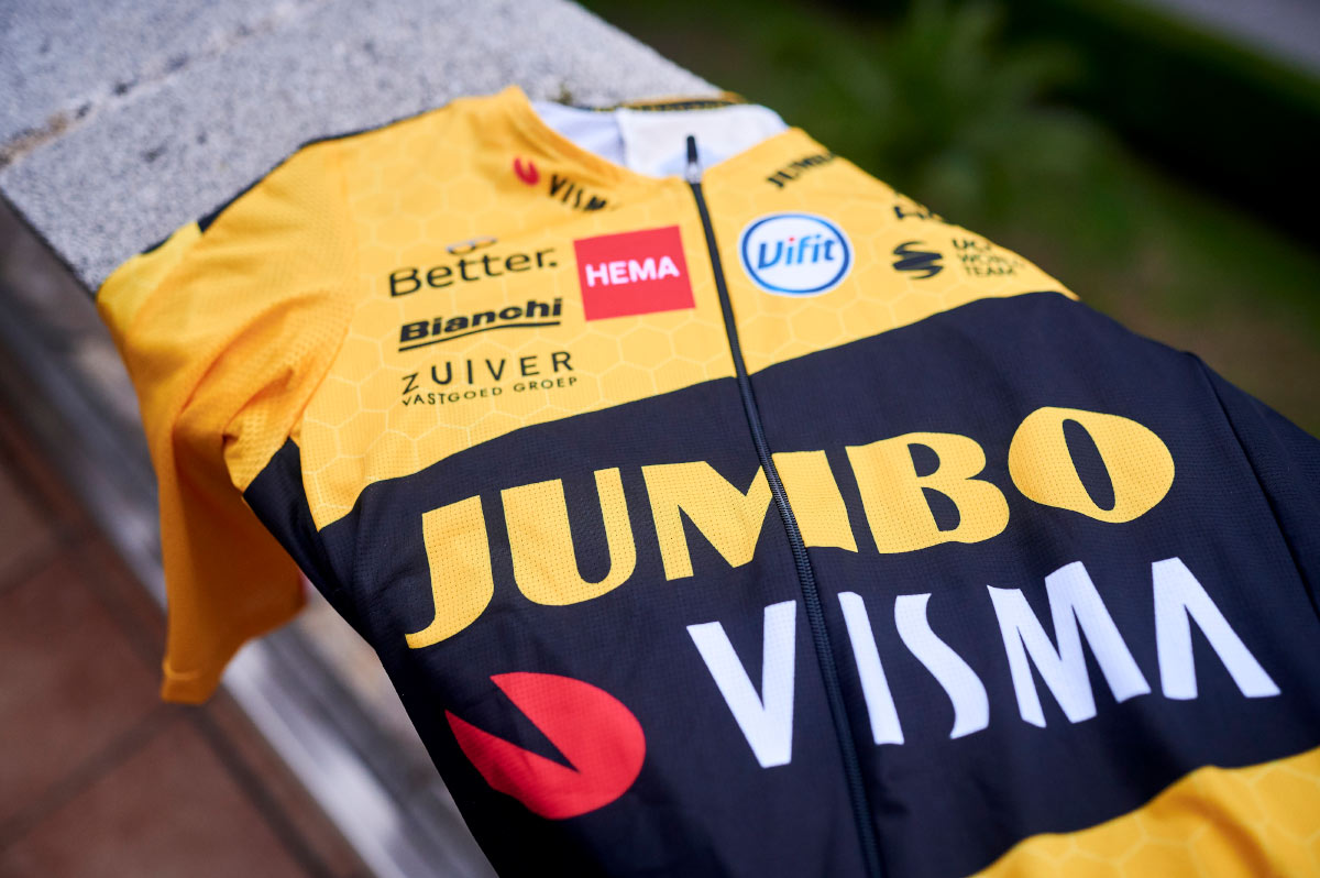 A Team-Jumbo-Visma jersey sits on a stone wall.